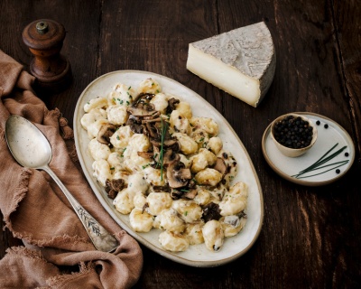 Photo de présentation de gnocchis crémeux au Saint-Nectaire et champignons