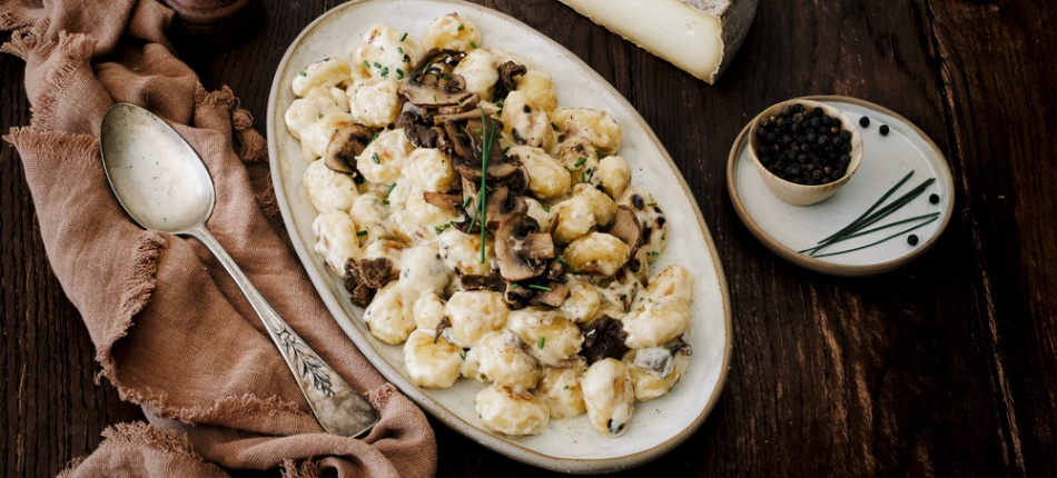 Photo de présentation de gnocchis crémeux au Saint-Nectaire et champignons