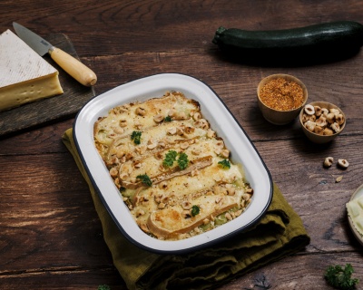 Photo de présentation d'un gratin de ravioles de Romans, courgettes et Saint-Nectaire