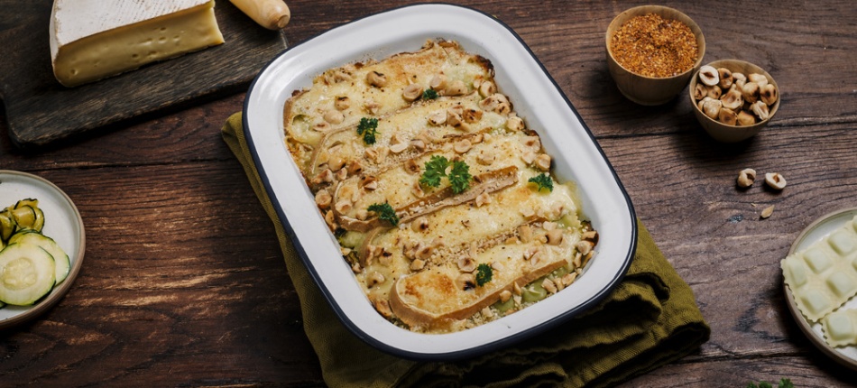 Photo de présentation d'un gratin de ravioles de Romans, courgettes et Saint-Nectaire